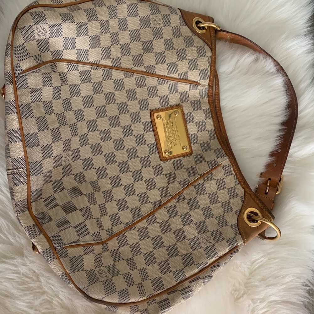White and tan Louis Vuitton day bag